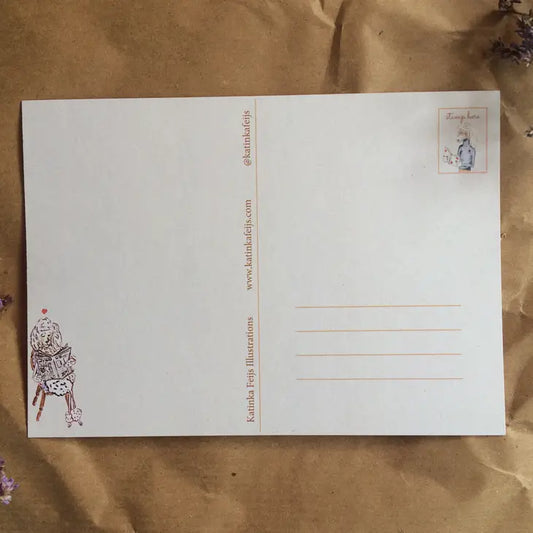 KORT - Puddel som leser avisen